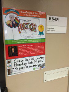 A poster hanging on the wall of grace cecil library.