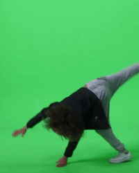 A person is doing a trick on the ground
