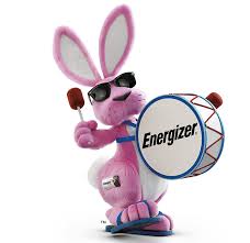 A pink bunny holding a drum and wearing sunglasses.